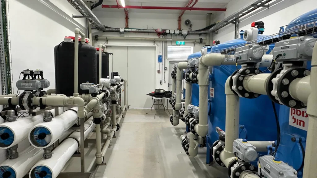 YWT industrial water treatment hall with reverse osmosis racks and media filters