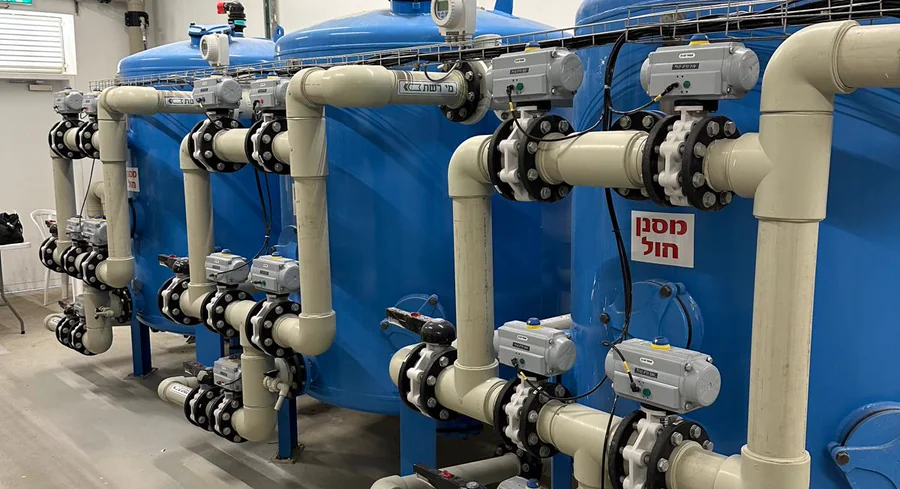Industrial sand filter vessels and actuated valve manifold at a YWT installation