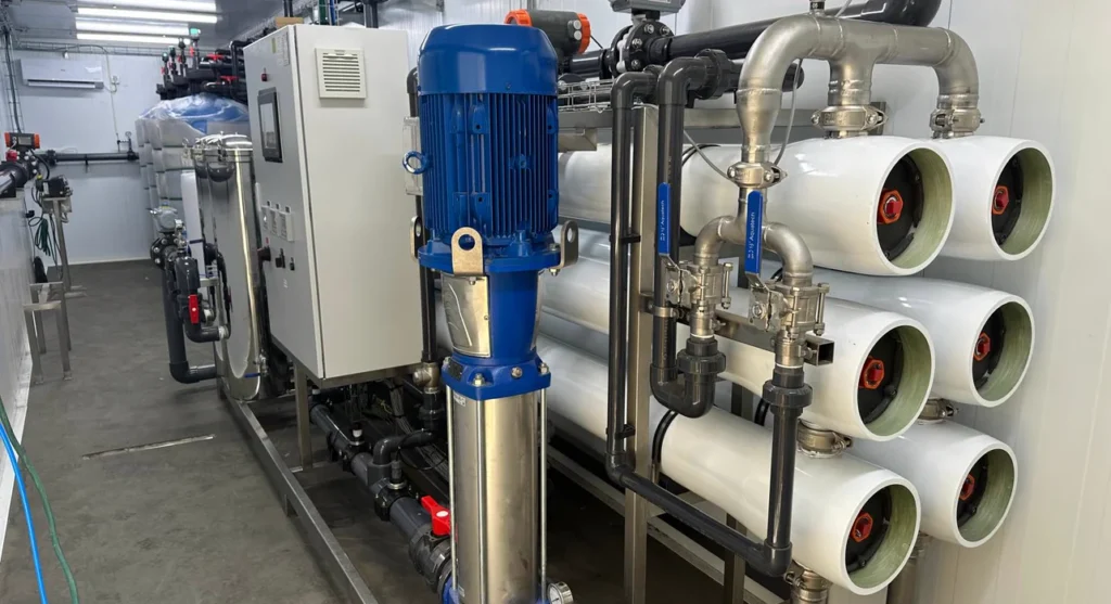YWT reverse osmosis skid and membrane vessels in an industrial water treatment room